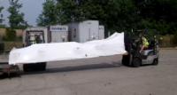 Picking Up A Vertical Platform Lift At A Freight Terminal